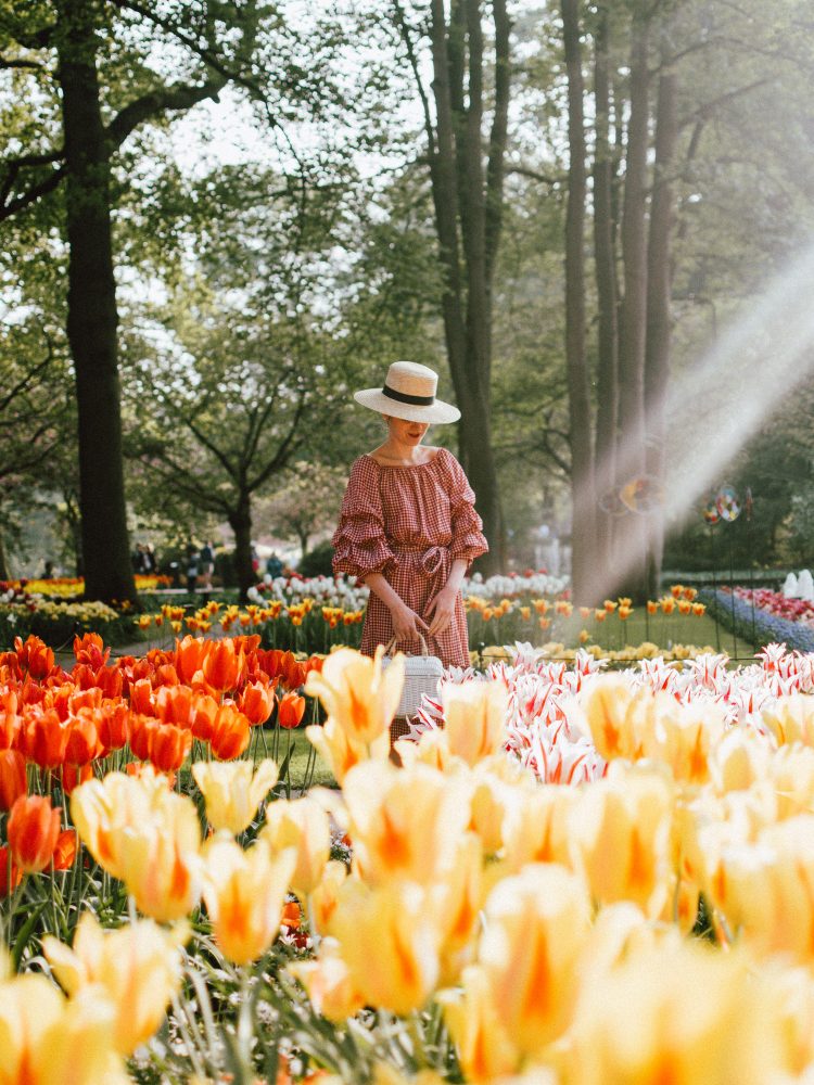 Keukenhof, red gingham dress, midi dress, gucci sneakers, straw bag, andreea birsan, couturezilla, cute summer outfit ideas 2018, when to visit the tulip fields in the netherlands, the best time to visit the dutch tulip fields, the keukenhof gardens, plan a trip to the netherlands, holland, dutch tulips, dutch tulip garden near amsterdam, the most beautiful park in europe, where to find the most beautiful flowers for photos, instagram worthy spots in holland, the popular tulip fields from instagram, the best time for visiting the popular tulip fields you keep seeing on instagram, zara sold out midi gingham dress, h&m straw boater hat, flower fields, white dress, straw bag, the white wicker bag from mango, mango white straw box bag, box bag, handmade bamboo bag, the best summer bags, handmade bags, soap bubbles, keukenhof park, keukenhof gardens, the price for a ticket at keukenhof, how’s the weather at keukenhof, lisse, the netherlands, hollidays in the netherlands, gucci ace heart embroidered sneakers, white leather trainers, white gucci shoes, gucci white shoes with hearts, gucci ace sneakers, the best gucci sneakers, how to look Parisian chic, European summer street style inspiration for women 2017, pinterest chic outfit ideas for woman, summer outfit ideas, summer ootd inspiration, outfit of the day, ootd, fashion icon, style inspiration, fashionista, fashion inspiration, style inspo, what to wear in summer, how to look French, chic on a budget, zara outfit, mango, topshop, asos, river island, forever 21, urban outfitters, how to mix high end pieces with luxury ones, zara and Gucci,outfit alternatives for summer, tomboy chic, minimal outfit, tumblr girls photos, pictures, happy girl, women, smart casual outfits, the best outfit ideas 2017, what to wear when you don’t feel inspired, summer in Europe, weekend attire, uniform, French women in summer, European outfit ideas 2017, minimal chic outfit, how to stand out, the best outfit ideas for summer, the sunglasses you have seen everywhere on Instagram, glasses, uk fashion blogger, united kingdom, uk fashion blog, fashion and travel blog, Europe, women with style, street style, summer fashion trends 2017, best fashion ideas, styling, fall fashion, fall outfit, fall ootd, fall perfect, transitional dressing, best transitional outfit ideas, how to wear statement earrings, dressing for autumn, autumn outfit, winter outfit ideas for work and school 2017