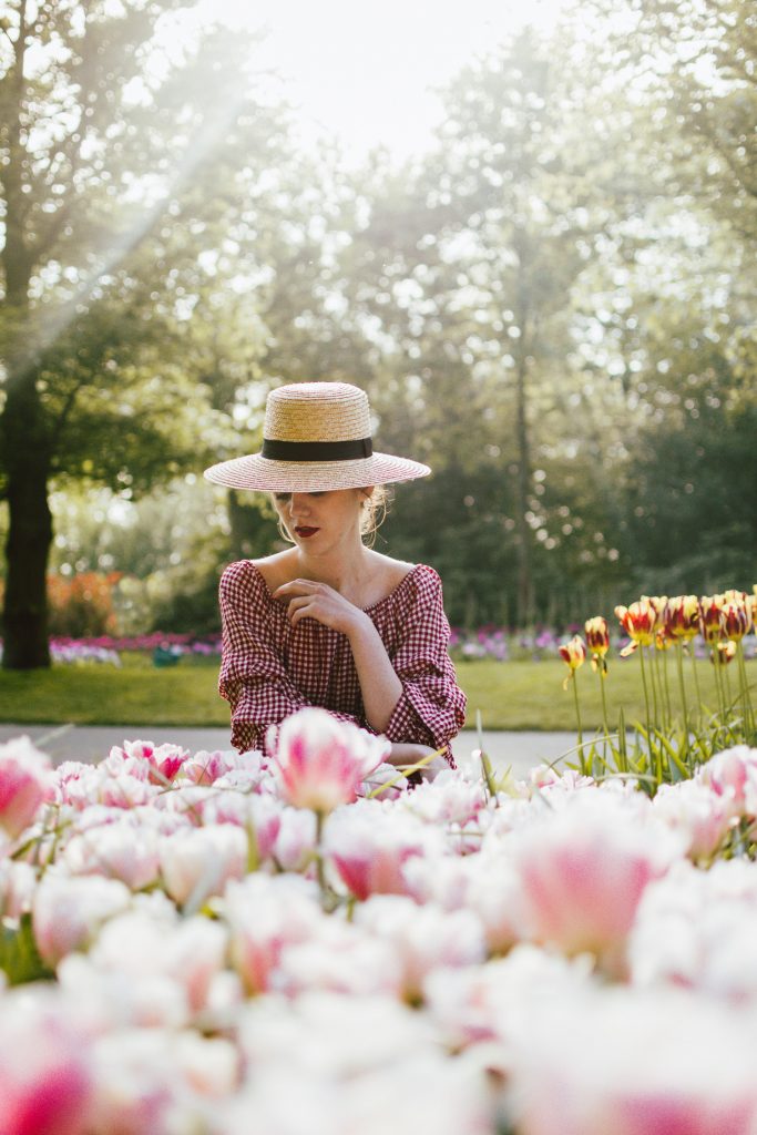 Keukenhof, red gingham dress, midi dress, gucci sneakers, straw bag, andreea birsan, couturezilla, cute summer outfit ideas 2018, when to visit the tulip fields in the netherlands, the best time to visit the dutch tulip fields, the keukenhof gardens, plan a trip to the netherlands, holland, dutch tulips, dutch tulip garden near amsterdam, the most beautiful park in europe, where to find the most beautiful flowers for photos, instagram worthy spots in holland, the popular tulip fields from instagram, the best time for visiting the popular tulip fields you keep seeing on instagram, zara sold out midi gingham dress, h&m straw boater hat, flower fields, white dress, straw bag, the white wicker bag from mango, mango white straw box bag, box bag, handmade bamboo bag, the best summer bags, handmade bags, soap bubbles, keukenhof park, keukenhof gardens, the price for a ticket at keukenhof, how’s the weather at keukenhof, lisse, the netherlands, hollidays in the netherlands, gucci ace heart embroidered sneakers, white leather trainers, white gucci shoes, gucci white shoes with hearts, gucci ace sneakers, the best gucci sneakers, how to look Parisian chic, European summer street style inspiration for women 2017, pinterest chic outfit ideas for woman, summer outfit ideas, summer ootd inspiration, outfit of the day, ootd, fashion icon, style inspiration, fashionista, fashion inspiration, style inspo, what to wear in summer, how to look French, chic on a budget, zara outfit, mango, topshop, asos, river island, forever 21, urban outfitters, how to mix high end pieces with luxury ones, zara and Gucci,outfit alternatives for summer, tomboy chic, minimal outfit, tumblr girls photos, pictures, happy girl, women, smart casual outfits, the best outfit ideas 2017, what to wear when you don’t feel inspired, summer in Europe, weekend attire, uniform, French women in summer, European outfit ideas 2017, minimal chic outfit, how to stand out, the best outfit ideas for summer, the sunglasses you have seen everywhere on Instagram, glasses, uk fashion blogger, united kingdom, uk fashion blog, fashion and travel blog, Europe, women with style, street style, summer fashion trends 2017, best fashion ideas, styling, fall fashion, fall outfit, fall ootd, fall perfect, transitional dressing, best transitional outfit ideas, how to wear statement earrings, dressing for autumn, autumn outfit, winter outfit ideas for work and school 2017