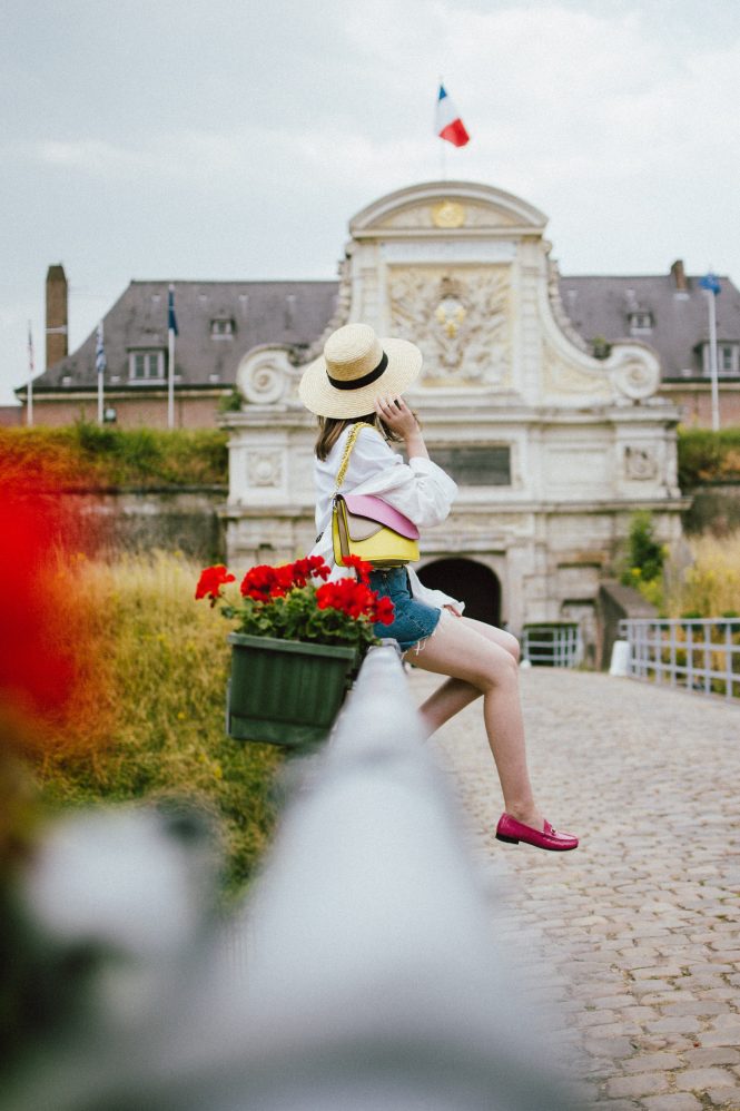 Levis mini denim skirt, pink gucci loafers, linen shirt, tshirt, colorblock bag, andreea birsan, couturezilla, cute summer outfit ideas 2018, the best denim mini skirt, printed t-shirt, white tee, organic cotton t-shirt, graphic t-shirt, colorful t-shirt, hawaii tee, isla fontaine color block bag, yellow and pink shoulder leather bag, the best leather bag, shoulder bag, italian leather, isla fontaine bags, how to wear a colorblock bag, unique bag strap, what to wear with a denim mini skirt, how not to look like a teenager in a mini skirt, pink gucci loafers, how to wear pink shoes, patent leather pink gucci shoes, pink gucci mules, classic mocassaini shoes, la femme gold chain belt, the sold out asos chain belt, budget friendly alternatives to the chanel chain belt, gold accessories, white button down oversized linen shirt, linen shirt, boyfriend linen shirt, summer layers, how to layer in summer, summers in europe, lille france, what to wear on an european vacation, denim minis, levis denim, live in denim, levis straus, levi’s skirt, raw hem mini skirt, skirt that fits like a glove, how to look Parisian chic, European summer street style inspiration for women 2017, pinterest chic outfit ideas for woman, summer outfit ideas, summer ootd inspiration, outfit of the day, ootd, fashion icon, style inspiration, fashionista, fashion inspiration, style inspo, what to wear in summer, how to look French, chic on a budget, zara outfit, mango, topshop, asos, river island, forever 21, urban outfitters, how to mix high end pieces with luxury ones, zara and Gucci,outfit alternatives for summer, tomboy chic, minimal outfit, tumblr girls photos, pictures, happy girl, women, smart casual outfits, the best outfit ideas 2017, what to wear when you don’t feel inspired, summer in Europe, weekend attire, uniform, French women in summer, European outfit ideas 2017, minimal chic outfit, how to stand out, the best outfit ideas for summer, the sunglasses you have seen everywhere on Instagram, glasses, uk fashion blogger, united kingdom, uk fashion blog, fashion and travel blog, Europe, women with style, street style, summer fashion trends 2017, best fashion ideas, styling, fall fashion, fall outfit, fall ootd, fall perfect, transitional dressing, best transitional outfit ideas, how to wear statement earrings, dressing for autumn, autumn outfit, winter outfit ideas for work and school 2017