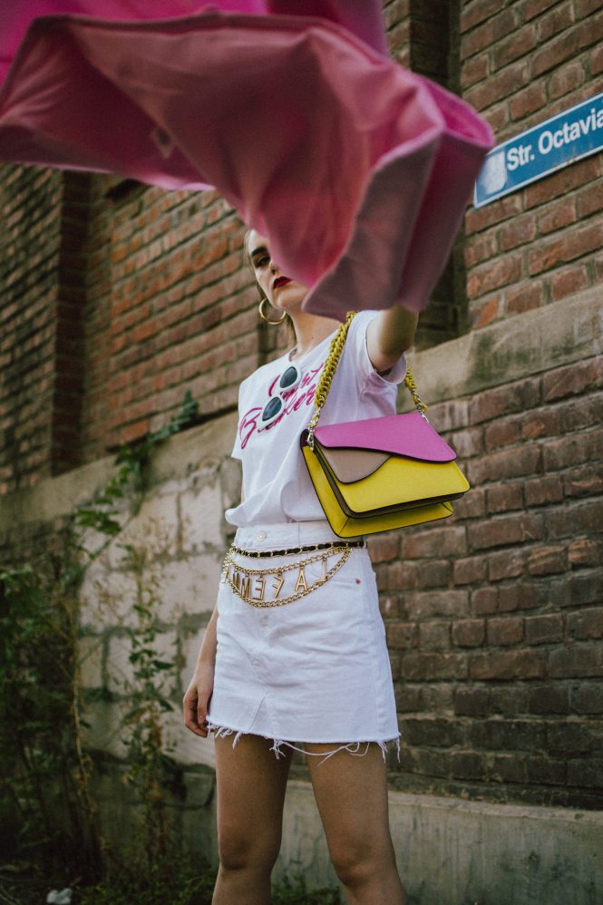 Pink blazer, white denim skirt, white tee, gucci sneakers, colorblock shoulder bag, andreea birsan, couturezilla, cute fall outfit ideas 2018, la femme gold chain belt, the chain belt trend, white cat eye sunglasses, cat eye sunnies, autumn outfit ideas, transitional outfits, pre-fall white and pink outfit 2018, what color to wear with pink, pink and white looks, how to transition your wardrobe to autumn, white mini raw hem denim skirt, deconstructed mini skirt, crisp white mango premium white denim skirt, what to wear with a mini skirt, what are the best shoes to wear with a mini skirt, gucci white and red sneakers, gucci white leather trainers, white gucci kicks, the ugly dad sneakers trend, gucci dad sneakers, bowling shoes trend, chunky trainers trend, chunky sneakers trend, white sunnies, heart breaker white t-shirt, white skirt and t-shirt, organic cotton tee, embroidered t-shirt, mini skirt, how to wear a mini skirt without looking vulgar, gucci shoes, isla fontaine pink and yellow leather bag, italian leather shoulder bag, italian bag, gold hoop earrings, hoop earrings, white and pink pre-fall 2018 outfit ideas for women, how to look Parisian chic, European summer street style inspiration for women 2017, pinterest chic outfit ideas for woman, summer outfit ideas, summer ootd inspiration, outfit of the day, ootd, fashion icon, style inspiration, fashionista, fashion inspiration, style inspo, what to wear in summer, how to look French, chic on a budget, zara outfit, mango, topshop, asos, river island, forever 21, urban outfitters, how to mix high end pieces with luxury ones, zara and Gucci,outfit alternatives for summer, tomboy chic, minimal outfit, tumblr girls photos, pictures, happy girl, women, smart casual outfits, the best outfit ideas 2017, what to wear when you don’t feel inspired, summer in Europe, weekend attire, uniform, French women in summer, European outfit ideas 2017, minimal chic outfit, how to stand out, the best outfit ideas for summer, the sunglasses you have seen everywhere on Instagram, glasses, uk fashion blogger, united kingdom, uk fashion blog, fashion and travel blog, Europe, women with style, street style, summer fashion trends 2017, best fashion ideas, styling, fall fashion, fall outfit, fall ootd, fall perfect, transitional dressing, best transitional outfit ideas, how to wear statement earrings, dressing for autumn, autumn outfit, winter outfit ideas for work and school 2017, double breasted pastel pink blazer