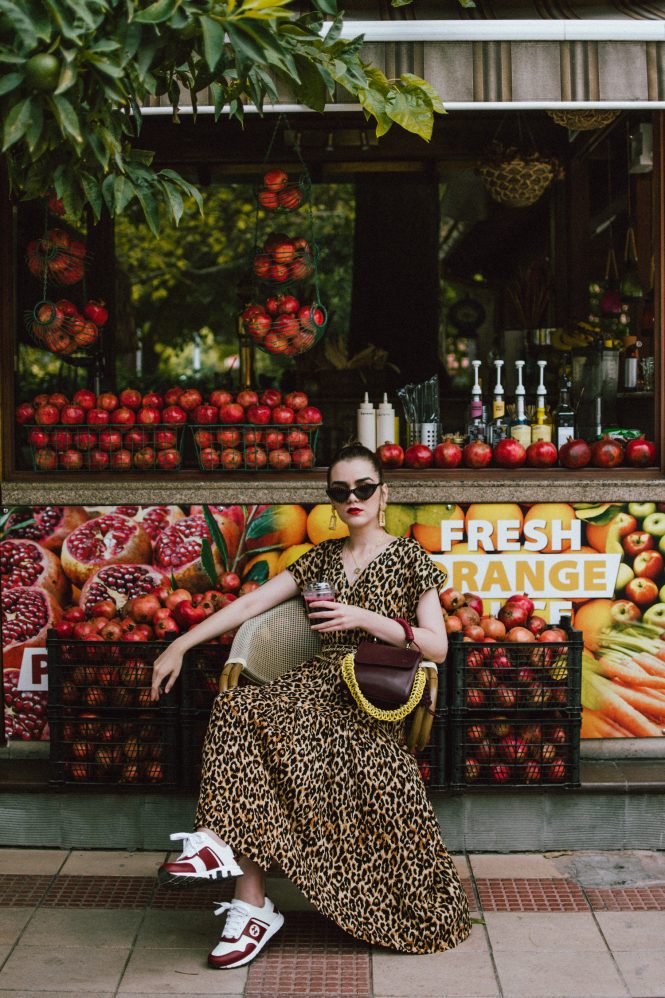 Zara maxi leopard print dress, animal print, gucci chunky trainers, cat eye sunglasses, burgundy bag, andreea birsan, couturezilla, cute fall outfit ideas 2018, leo print, animal print, zara leo print dress, animal print clothing, how to wear animal print, how to wear leo print, the best way to rock leo print, how to wear a maxi dress like a pro, what shoes to wear with a maxi dress, gucci white and burgundy chunky trainers, dad sneakers, gucci dad sneakers, gucci ugly sneakers trend, how to wear the chunky trainers you’ve seen all over instagram, dress and sneakers outfit, how to wear a maxi dress with sneakers, what colors to wear with animal print, colors that go with leopard print, the best way to wear leopard print, pointy cat eye black sunglasses, moschino inspired cat eye sunglasses, studded sunglasses, burgundy leather bag, lady bag, italian leather bag, mini bag, burgundy bag and leopard printed dress, celine gold leather inspired necklace, gold accessories, izmir turkey, andreea birsan travel outfit, what to wear in autumn, the best print to wear this autumn, how to look Parisian chic, European summer street style inspiration for women 2017, pinterest chic outfit ideas for woman, summer outfit ideas, summer ootd inspiration, outfit of the day, ootd, fashion icon, style inspiration, fashionista, fashion inspiration, style inspo, what to wear in summer, how to look French, chic on a budget, zara outfit, mango, topshop, asos, river island, forever 21, urban outfitters, how to mix high end pieces with luxury ones, zara and Gucci,outfit alternatives for summer, tomboy chic, minimal outfit, tumblr girls photos, pictures, happy girl, women, smart casual outfits, the best outfit ideas 2017, what to wear when you don’t feel inspired, summer in Europe, weekend attire, uniform, French women in summer, European outfit ideas 2017, minimal chic outfit, how to stand out, the best outfit ideas for summer, the sunglasses you have seen everywhere on Instagram, glasses, uk fashion blogger, united kingdom, uk fashion blog, fashion and travel blog, Europe, women with style, street style, summer fashion trends 2017, best fashion ideas, styling, fall fashion, fall outfit, fall ootd, fall perfect, transitional dressing, best transitional outfit ideas, how to wear statement earrings, dressing for autumn, autumn outfit, winter outfit ideas for work and school 2017