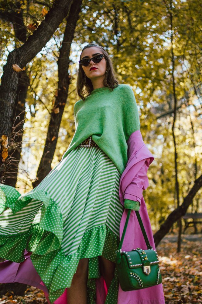 How to look fashionable on a very strict budget, pink trench coat, green asymmetric polka dot skirt, green sweater, andreea birsan street style, couturezilla, cute fall outfit ideas 2018, how to wear green from head to toe, green fall outfit, autumn green outfit for women 2018, how to pull off an all green outfit, soft green knit, green sweater, green knitwear, light green sweater, midi skirt with dots and stripes, statement skirt, topshop skirt, topshop style, high street finds, green and white midi asymmetric skirt with dots and stripes, polka dot skirt, striped skirt, how to wear polka dots, how to wear a polka dot skirt and a sweater, polka dot skirt and green sweater, green skirt and green sweater, midi skirt and sneakers, how to wear skirts with sneakers, pink and green outfit, color block outfit, zara pink trench coat, how to wear a colorful trench coat, how to wear pink, how to wear a pink trench coat, pink trench coat fall outfit 2018, pink trench coat and green skirt and sweater, trench coat weather, trench coat street style outfit, gucci ace heart embroidered sneakers, whie leather gucci sneakers, gucci trainers, gucci white kicks, how to pull off white sneakers and skirts, autumn layers, warm autumn outfit, black moschino inspired cat eye sunglasses, clear lens glasses, fall in the park, green leather shoulder prada bag with studs and stones, prada green leather bag, statement bag, how to look Parisian chic, European summer street style inspiration for women 2017, pinterest chic outfit ideas for woman, summer outfit ideas, summer ootd inspiration, outfit of the day, ootd, fashion icon, style inspiration, fashionista, fashion inspiration, style inspo, what to wear in summer, how to look French, chic on a budget, zara outfit, mango, topshop, asos, river island, forever 21, urban outfitters, how to mix high end pieces with luxury ones, zara and Gucci,outfit alternatives for summer, tomboy chic, minimal outfit, tumblr girls photos, pictures, happy girl, women, smart casual outfits, the best outfit ideas 2017, what to wear when you don’t feel inspired, summer in Europe, weekend attire, uniform, French women in summer, European outfit ideas 2017, minimal chic outfit, how to stand out, the best outfit ideas for summer, the sunglasses you have seen everywhere on Instagram, glasses, uk fashion blogger, united kingdom, uk fashion blog, fashion and travel blog, Europe, women with style, street style, summer fashion trends 2017, best fashion ideas, styling, fall fashion, fall outfit, fall ootd, fall perfect, transitional dressing, best transitional outfit ideas, how to wear statement earrings, dressing for autumn, autumn outfit, winter outfit ideas for work and school