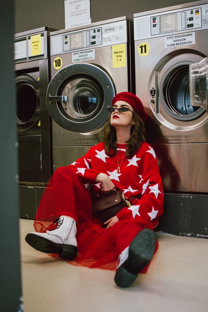 Oversized red star sweater, red tulle midi skirt, white leather boots, burgundy bag, beret, cute winter outfit ideas 2018, andreea birsan street style, couturezilla, star printed sweater, oversized sweater with stars, midi tulle skirt, oversized sweater and tulle skirt combo, how to wear an all red winter outfit, all red outfit, white leather military boots, combat boots, how to wear white boots, genuine leather boots, dark red leather bag, isla fontaine lady bag, burgundy lady bag, italian leather bags, colorful stockings, how to wear red tights, how to dress in winter and stay warm, winter layers, how to wear an all red outfit and not be cold in winter, color alternatives to wearing black in winter, celine inspired letter necklace, A pendant necklace, gold necklace, how to wear a beret, how to style a beret, wavy hair and beret, how to look chic in an all red outfit, french chic winter outfit, feminine skirt with military boots, edgy winter outfit, chic outfit ideas for winter, how to look Parisian chic, European summer street style inspiration for women 2017, pinterest chic outfit ideas for woman, summer outfit ideas, summer ootd inspiration, outfit of the day, ootd, fashion icon, style inspiration, fashionista, fashion inspiration, style inspo, what to wear in summer, how to look French, chic on a budget, zara outfit, mango, topshop, asos, river island, forever 21, urban outfitters, how to mix high end pieces with luxury ones, zara and Gucci,outfit alternatives for summer, tomboy chic, minimal outfit, tumblr girls photos, pictures, happy girl, women, smart casual outfits, the best outfit ideas 2017, what to wear when you don’t feel inspired, summer in Europe, weekend attire, uniform, French women in summer, European outfit ideas 2017, minimal chic outfit, how to stand out, the best outfit ideas for summer, the sunglasses you have seen everywhere on Instagram, glasses, uk fashion blogger, united kingdom, uk fashion blog, fashion and travel blog, Europe, women with style, street style, summer fashion trends 2017, best fashion ideas, styling, fall fashion, fall outfit, fall ootd, fall perfect, transitional dressing, best transitional outfit ideas, how to wear statement earrings, dressing for autumn, autumn outfit, winter outfit ideas for work and school